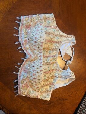 Embellished White Beaded lehenga blouse with  Pastel Accents
